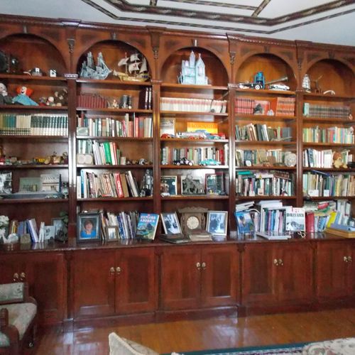 Built cherry wood book shelves and cabinets