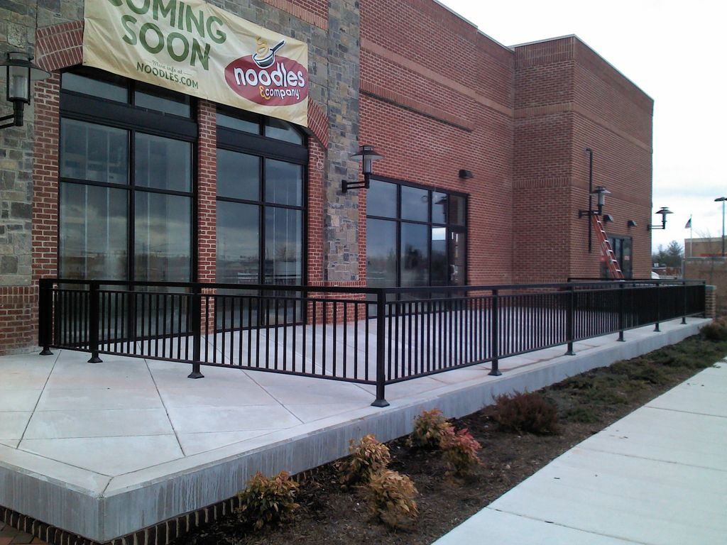 Noodles & Company fence.