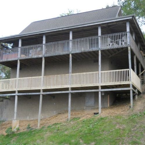 Replacing the deck on this house in the mountains