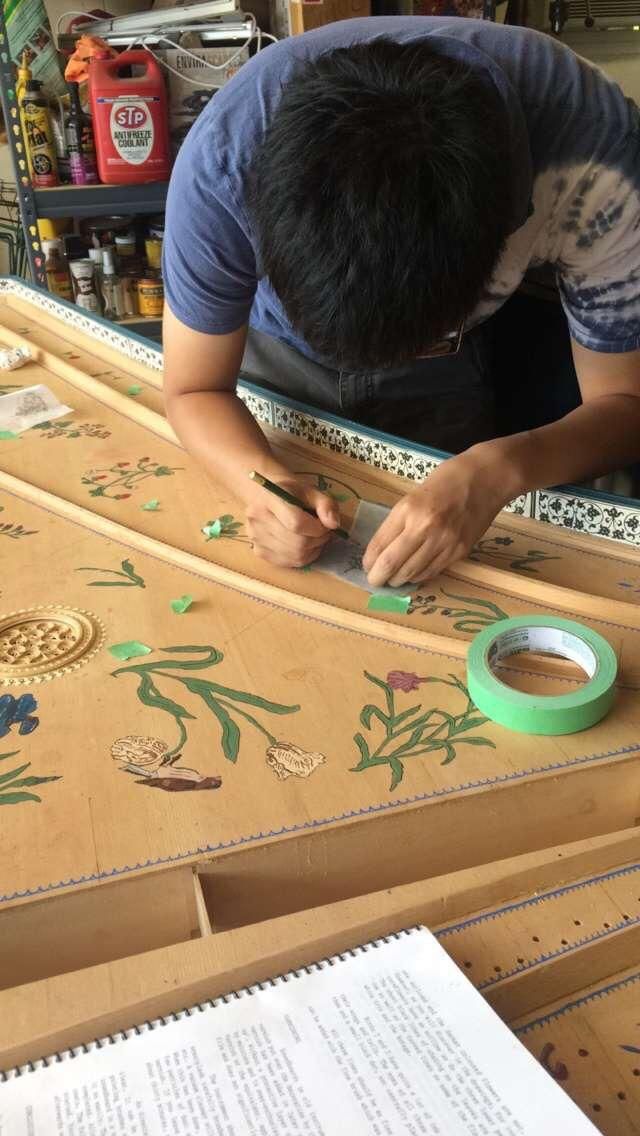 Decorating a harpsichord soundboard