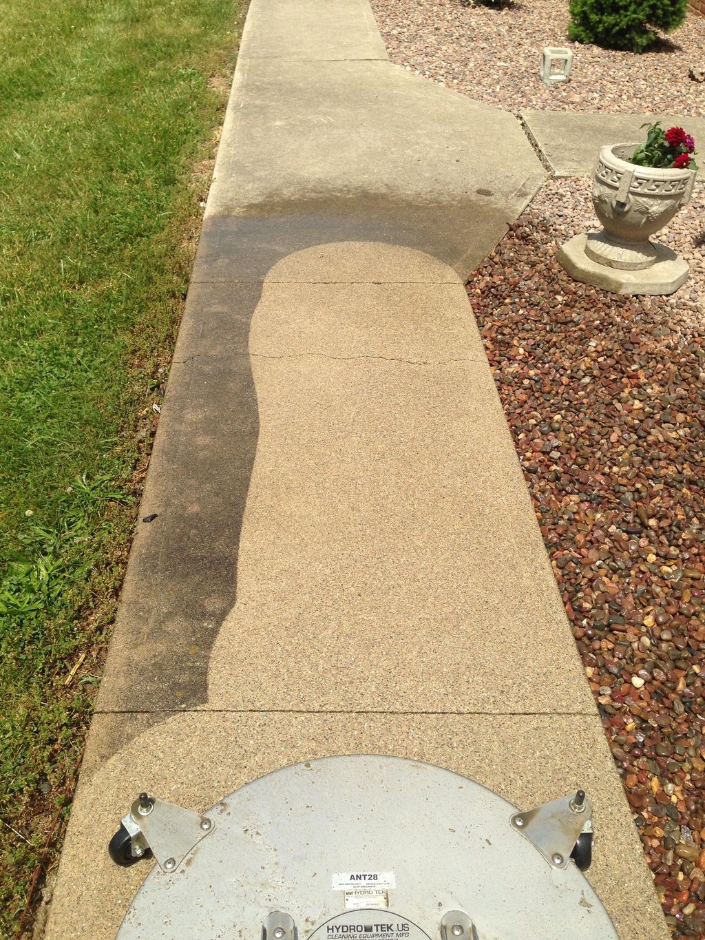 This residential sidewalk looks newly poured after