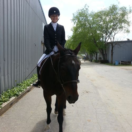 Happy student on her favorite horse in their first