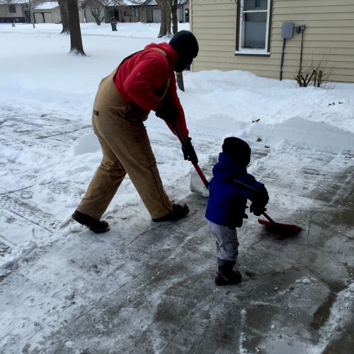 Cleaning an Iowa winter's snowfall with my little 