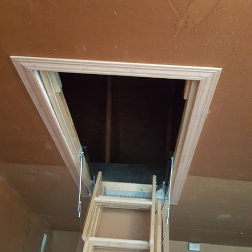 New attic access ladder installed where there was 
