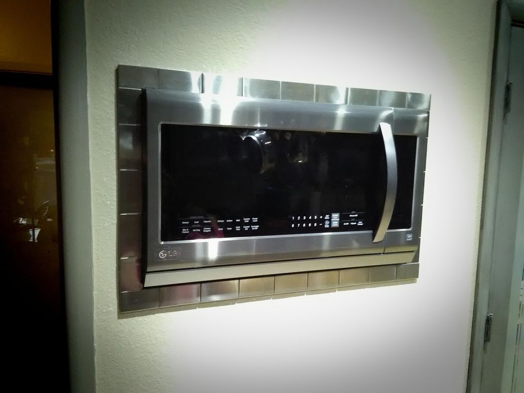 In wall microwave with stainless steel clad porcel