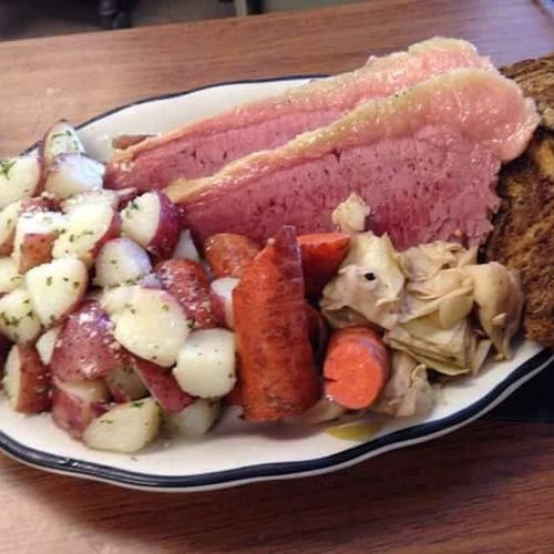 Corned beef brisket potatoes carrots and cabbage a