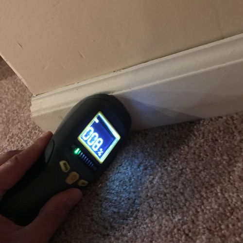 Checking the basement with a moisture meter can un