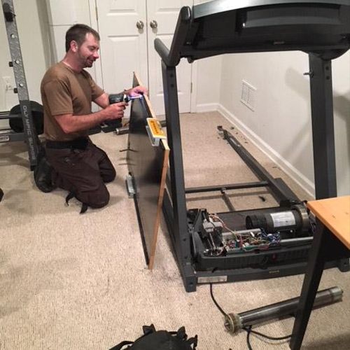 Replacing deck and running belt on a treadmill in 