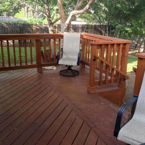 new deck that extends out from existing patio.