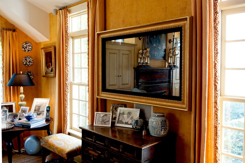 TV behind Mirrored Frame