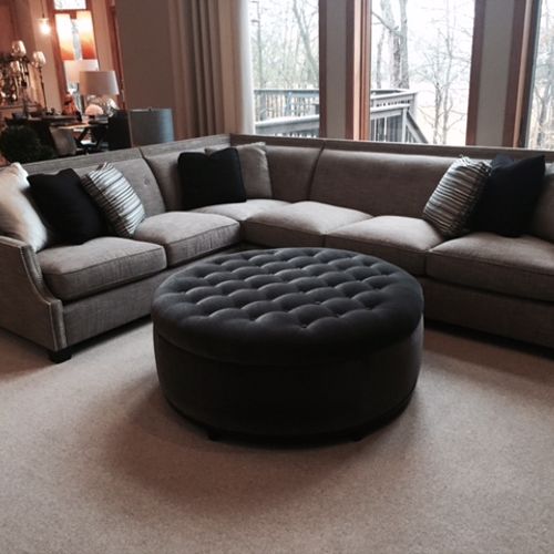 Tufted ottoman adds great texture to the room