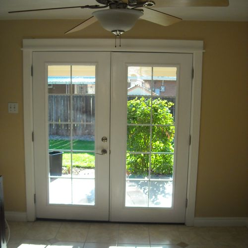 French doors, fan, paint and flooring