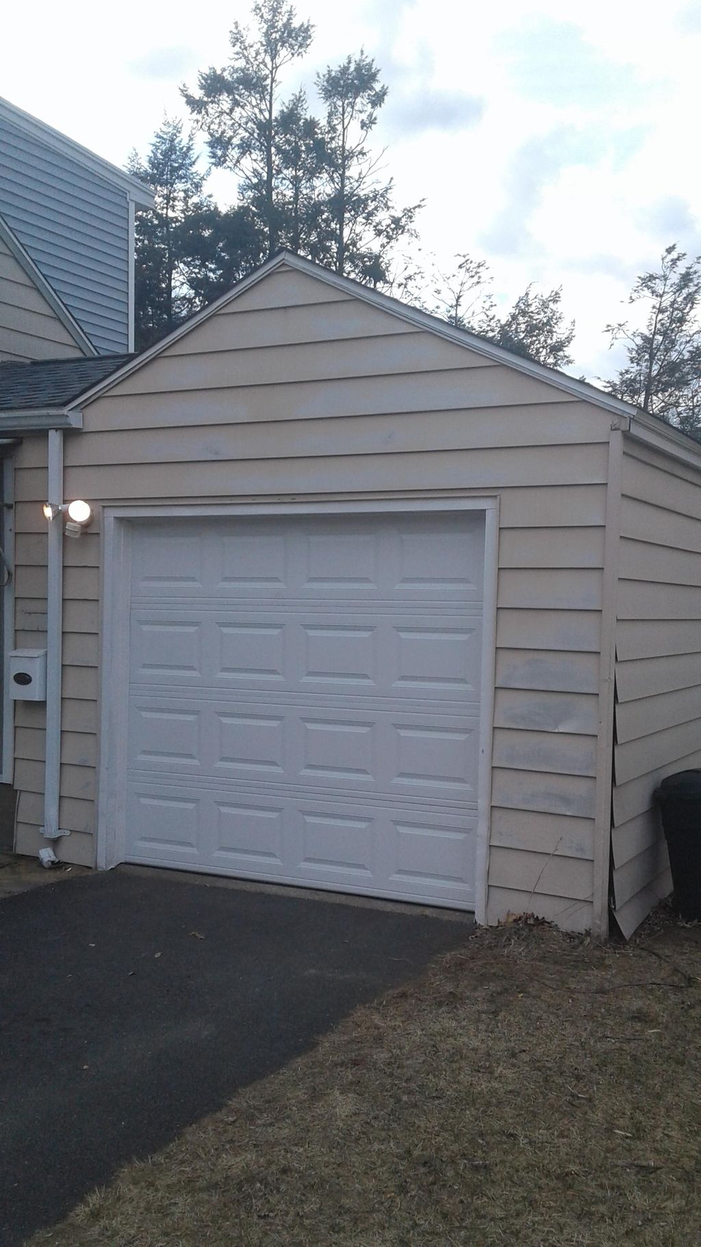 After:  New steel security door, white doors look 