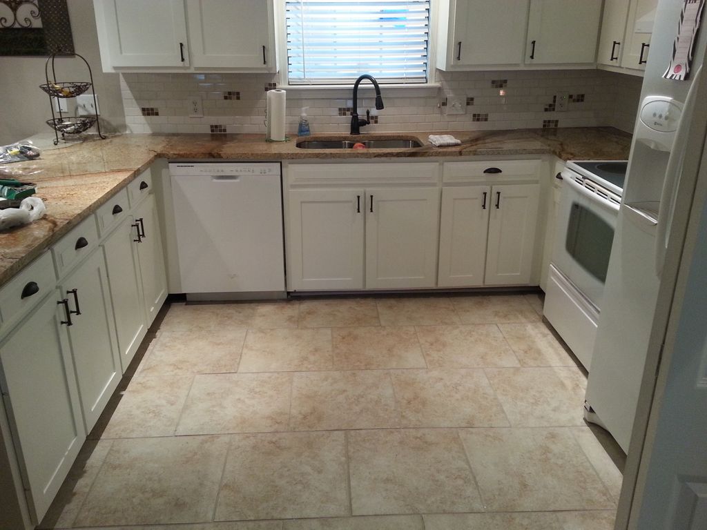 Resurfaced cabinets and built new doors, new count