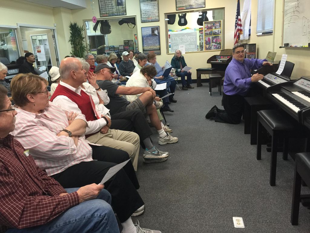 Alan Teaching a Group Music Workshop