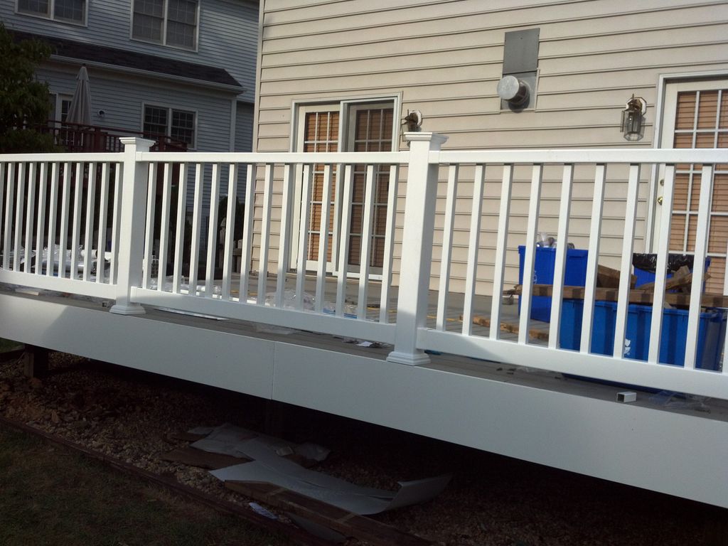 Converted an old weathered deck into a vinyl trimm