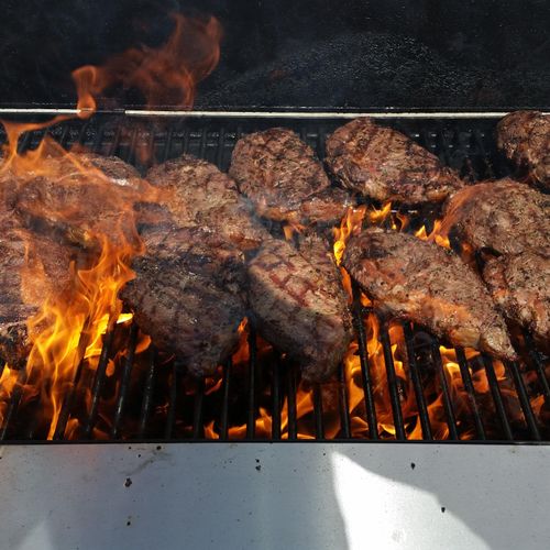 Steaks grilled on site.