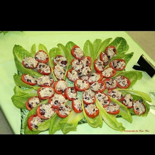 chicken salad with cranberries and pecans in tomat