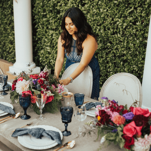 final touches on a beautiful tablescape