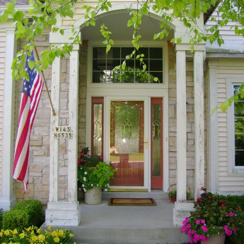 Exterior door, porch, siding, trim, gutters, colum