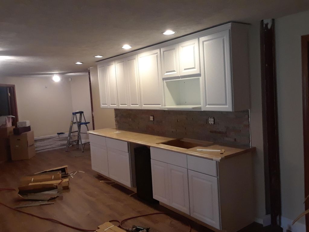 cabinet installation and back splash.