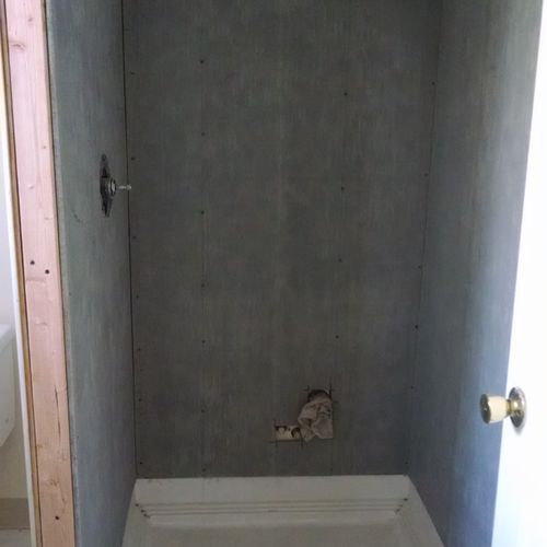 adding a shower to a bathroom backer-board all aro