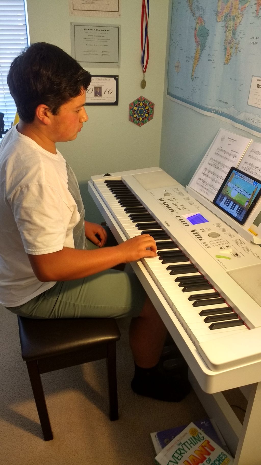 16 year old student learns to play with piano maes