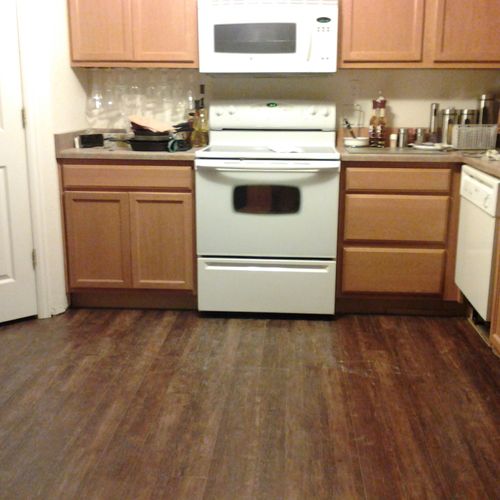 Finished kitchen with new laminate floor installed
