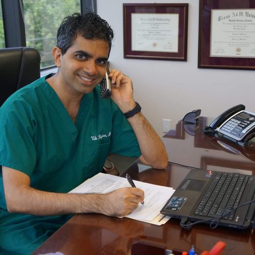 Dr. Rajan answering the phone