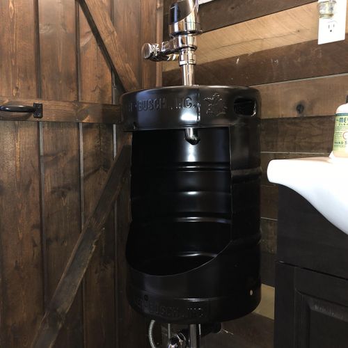 Customer urinal we fabricated using a beer keg, al