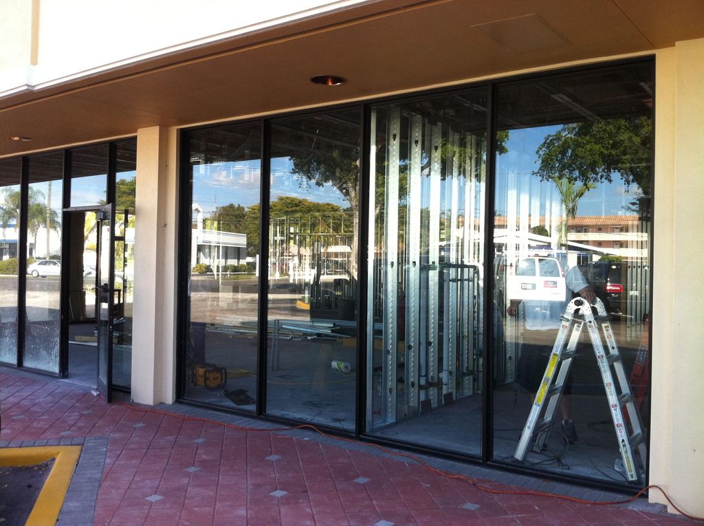 Installing Window tint to reduce heat and UV rays