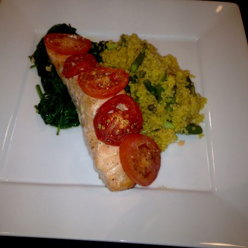 Roasted salmon with plum tomato with spinach and c