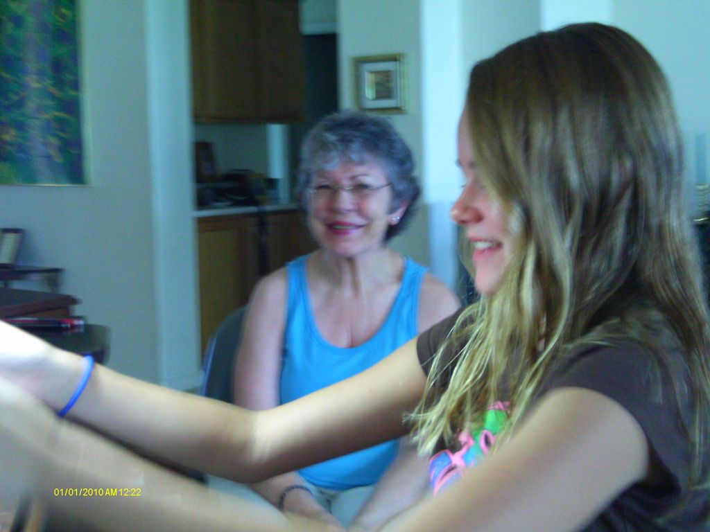 Gail and Sarah enjoy a joke during lesson in Music