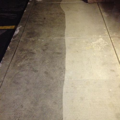 Store Front walk way power washed.