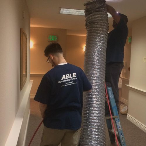 ABLE Duct men, hard at work.