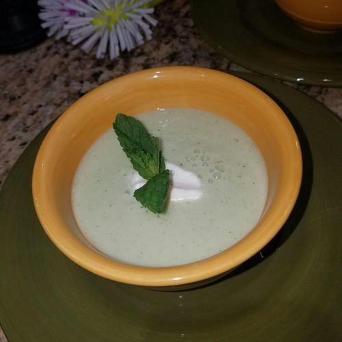 Chilled cucumber soup with goat cheese and mint