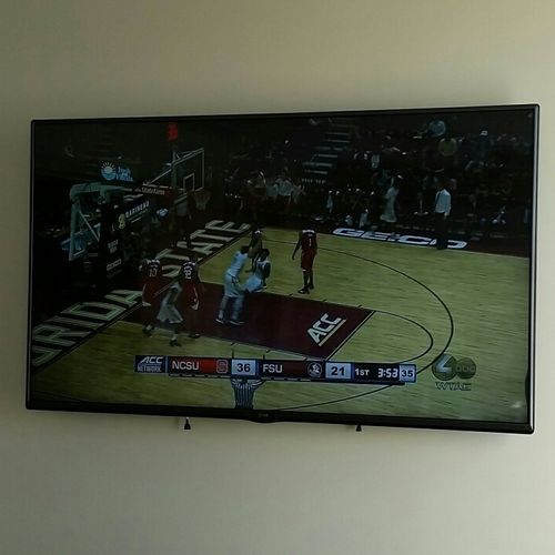 Conference Room T.V. mounted on wall.