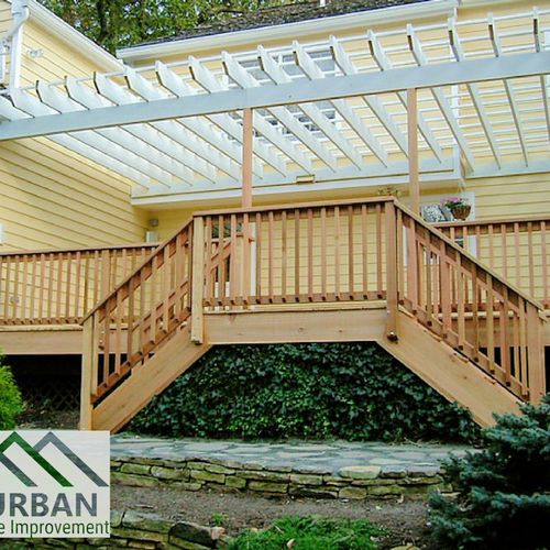 Deck and pergola by Suburban Home Improvement