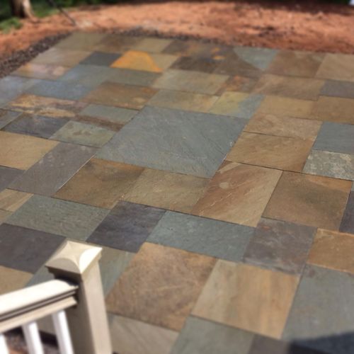 Custom designed closed joint blue stone patio with
