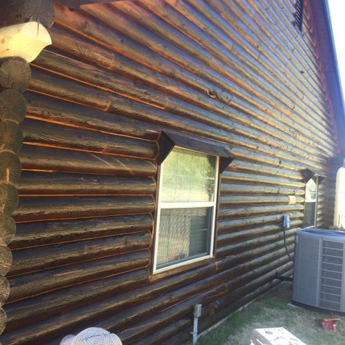 We prepped and stained this log cabin 