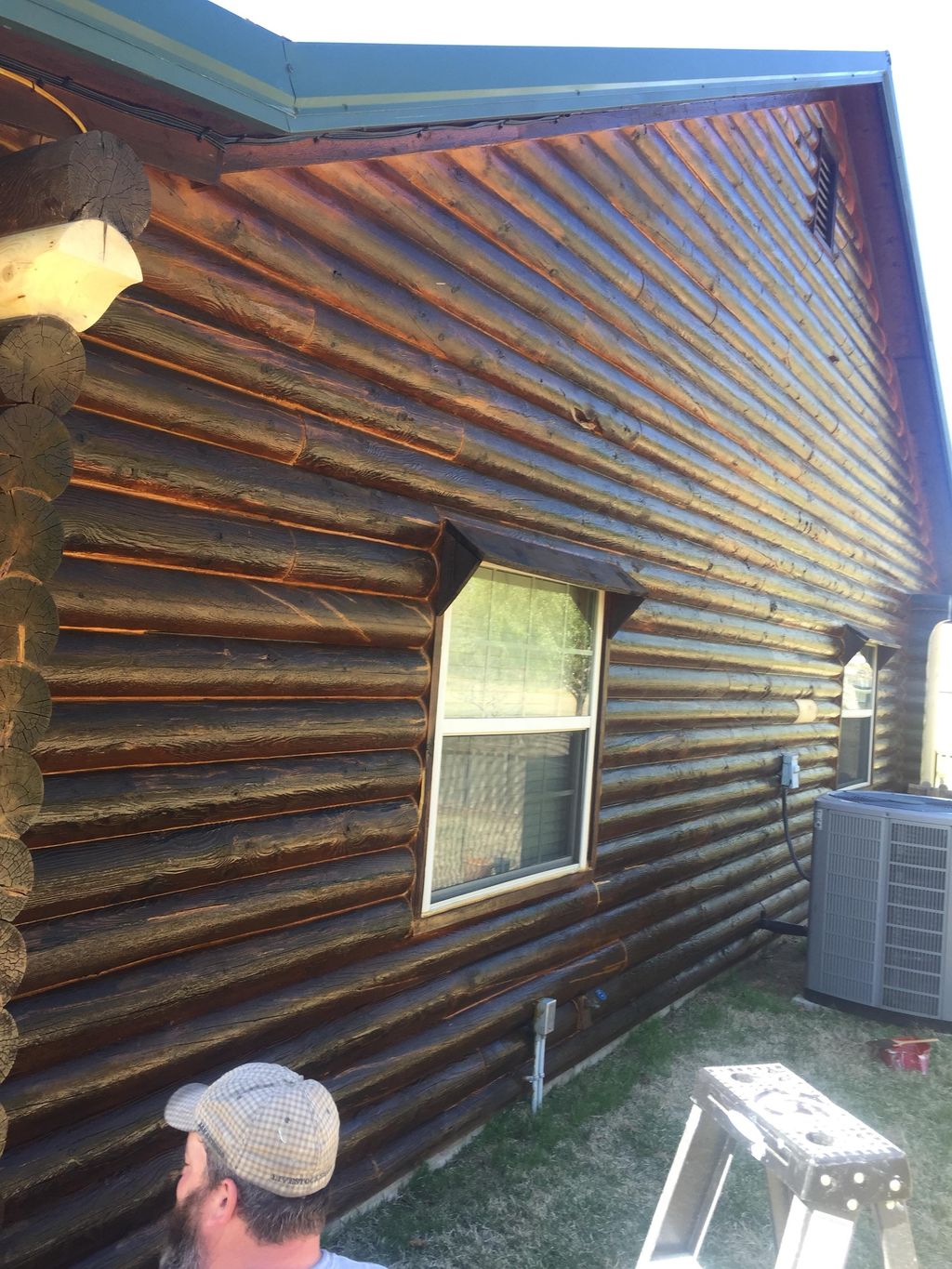 We prepped and stained this log cabin 