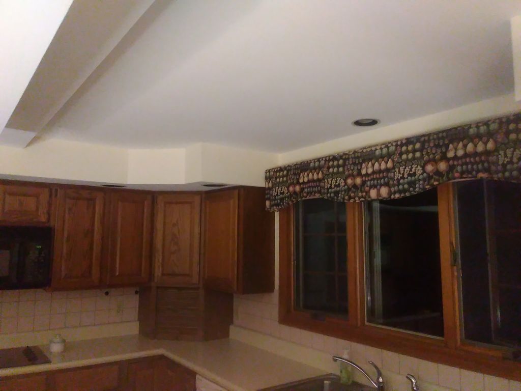 Popcorn ceiling removed, custom paint job.