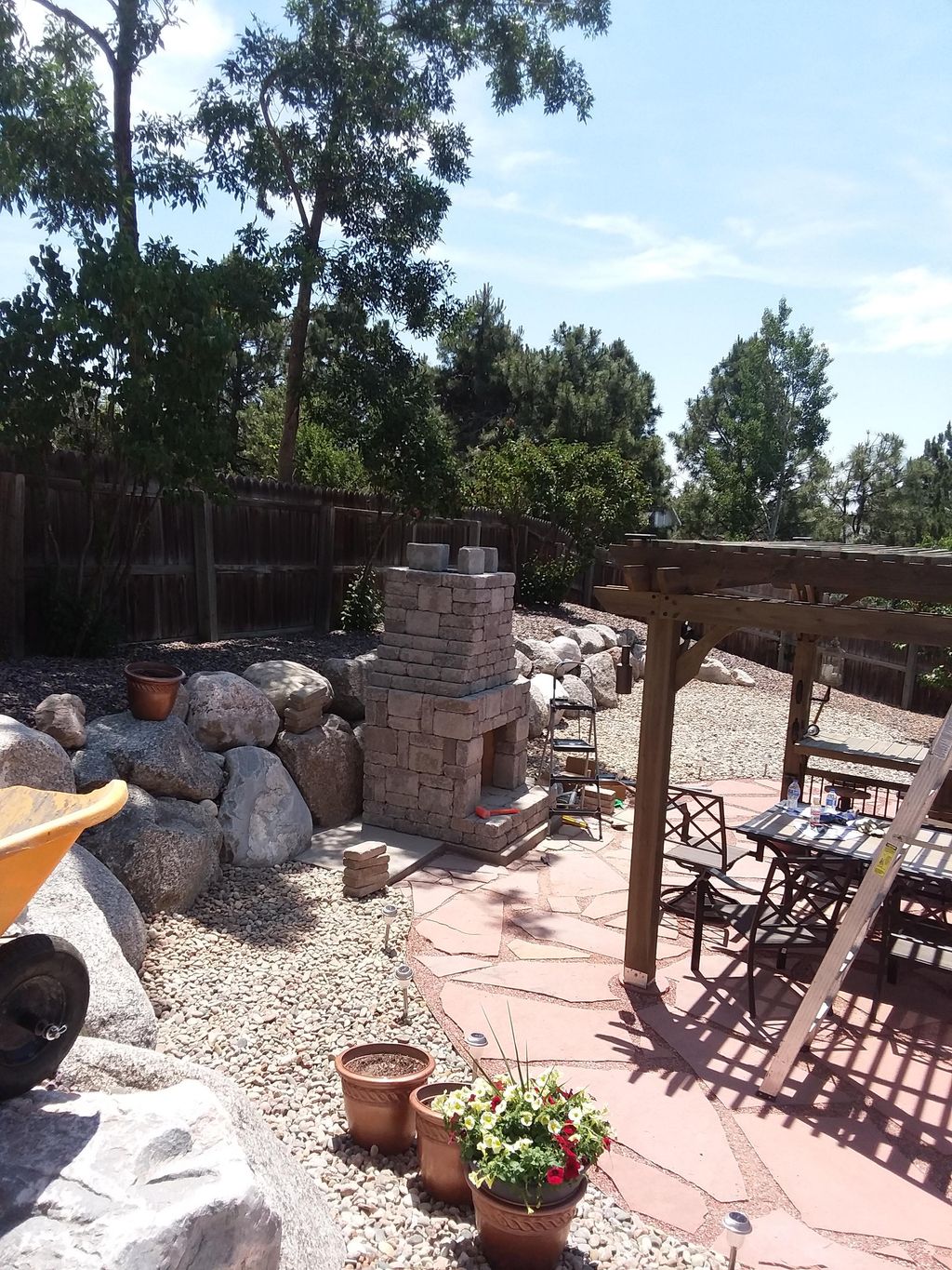 He loved his new outdoor fire place , it took 2 da