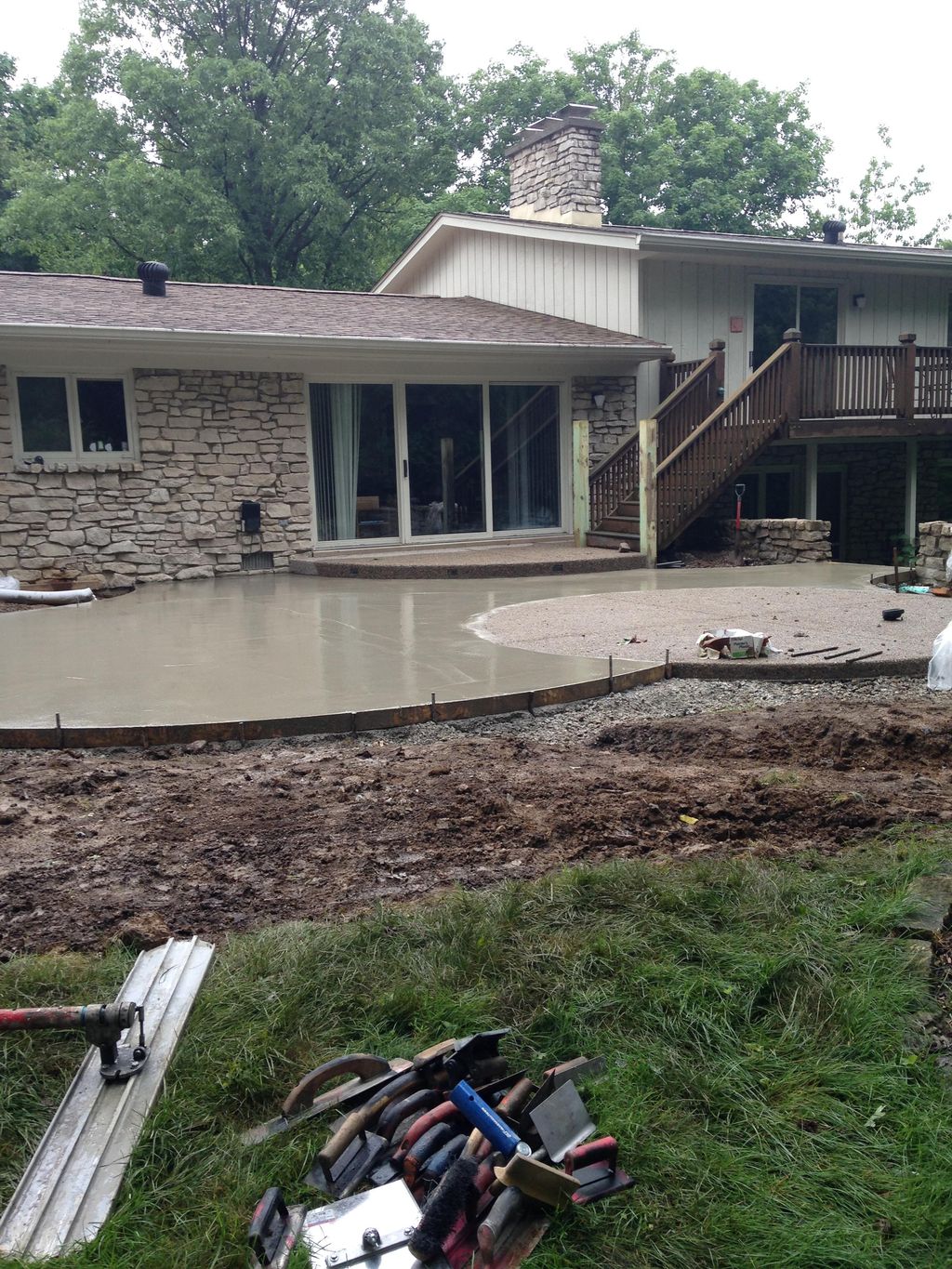 shapely concrete patio by pool