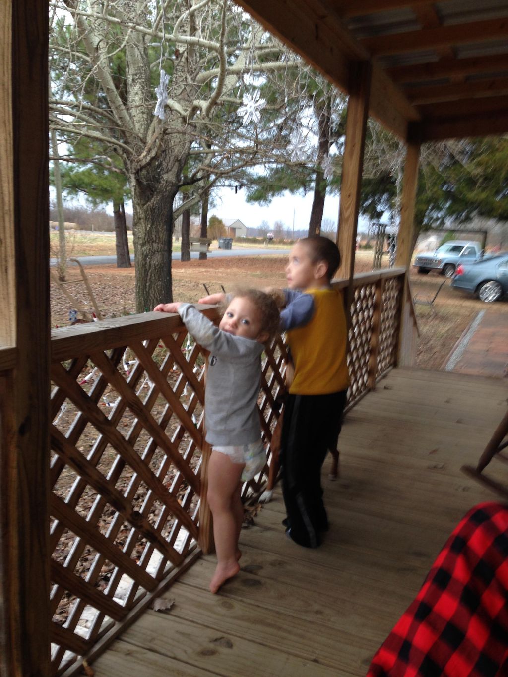 Covered deck on mobile home, attached with steps. 
