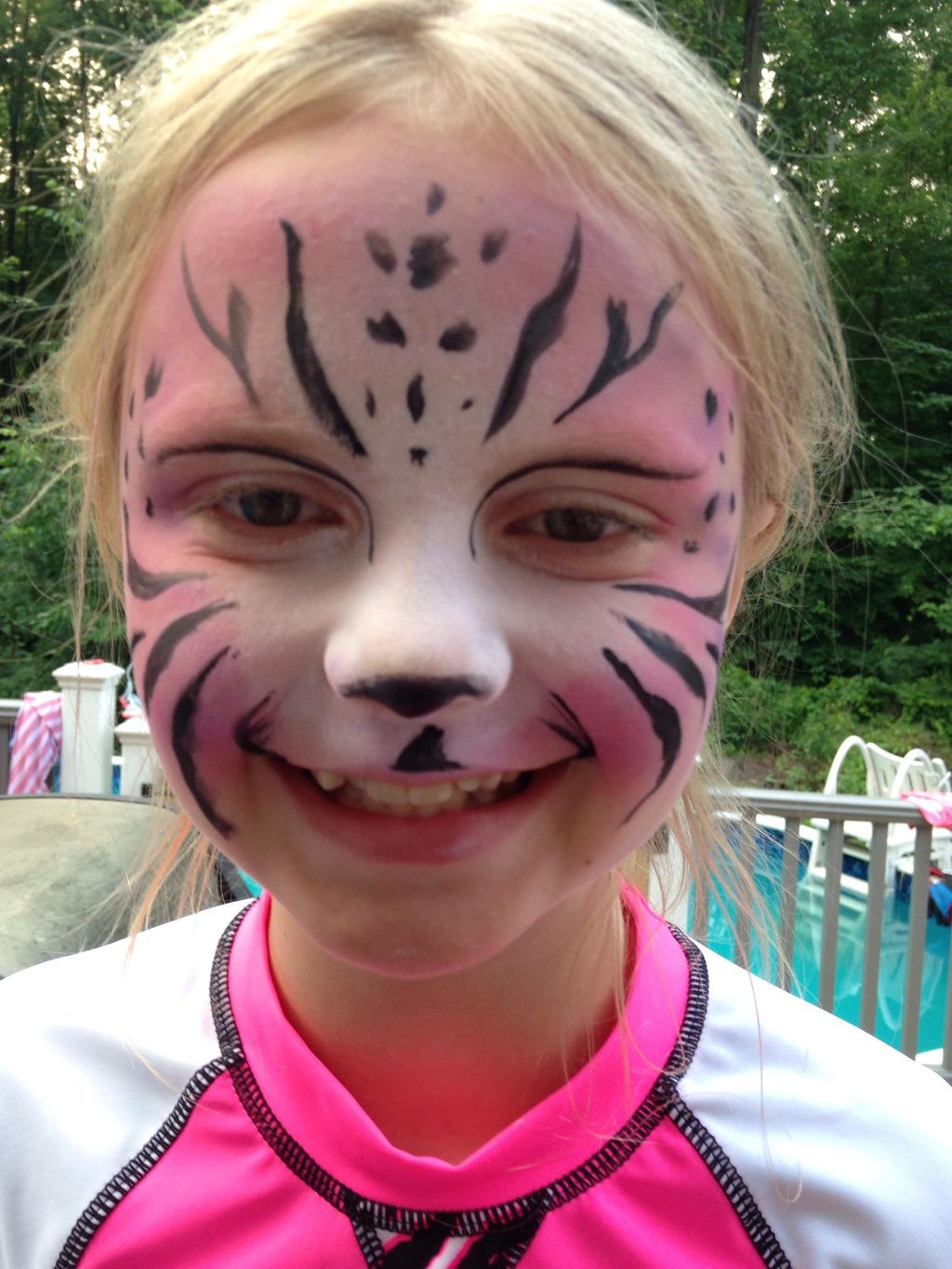 Pink tiger face painting