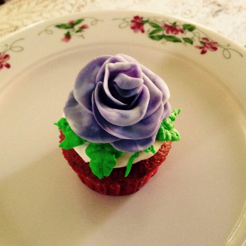 purple fondant flower cupcake