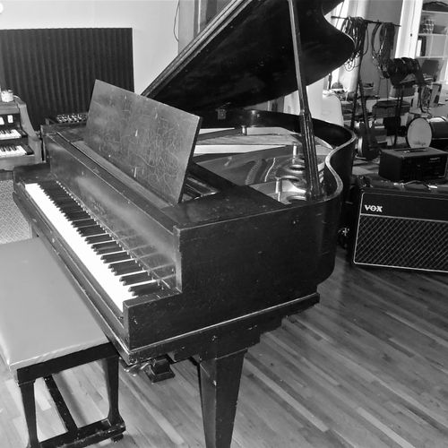 Newly restored Ivers & Pond Baby Grand Piano.