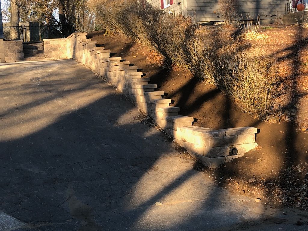 Building retaing wall & stairs with proper drainag