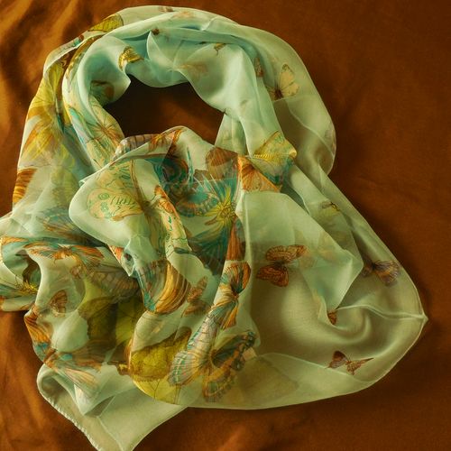 100% silk scarf with a beautiful butterfly theme.